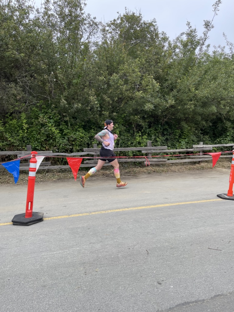 me, crossing the finish line at full effort